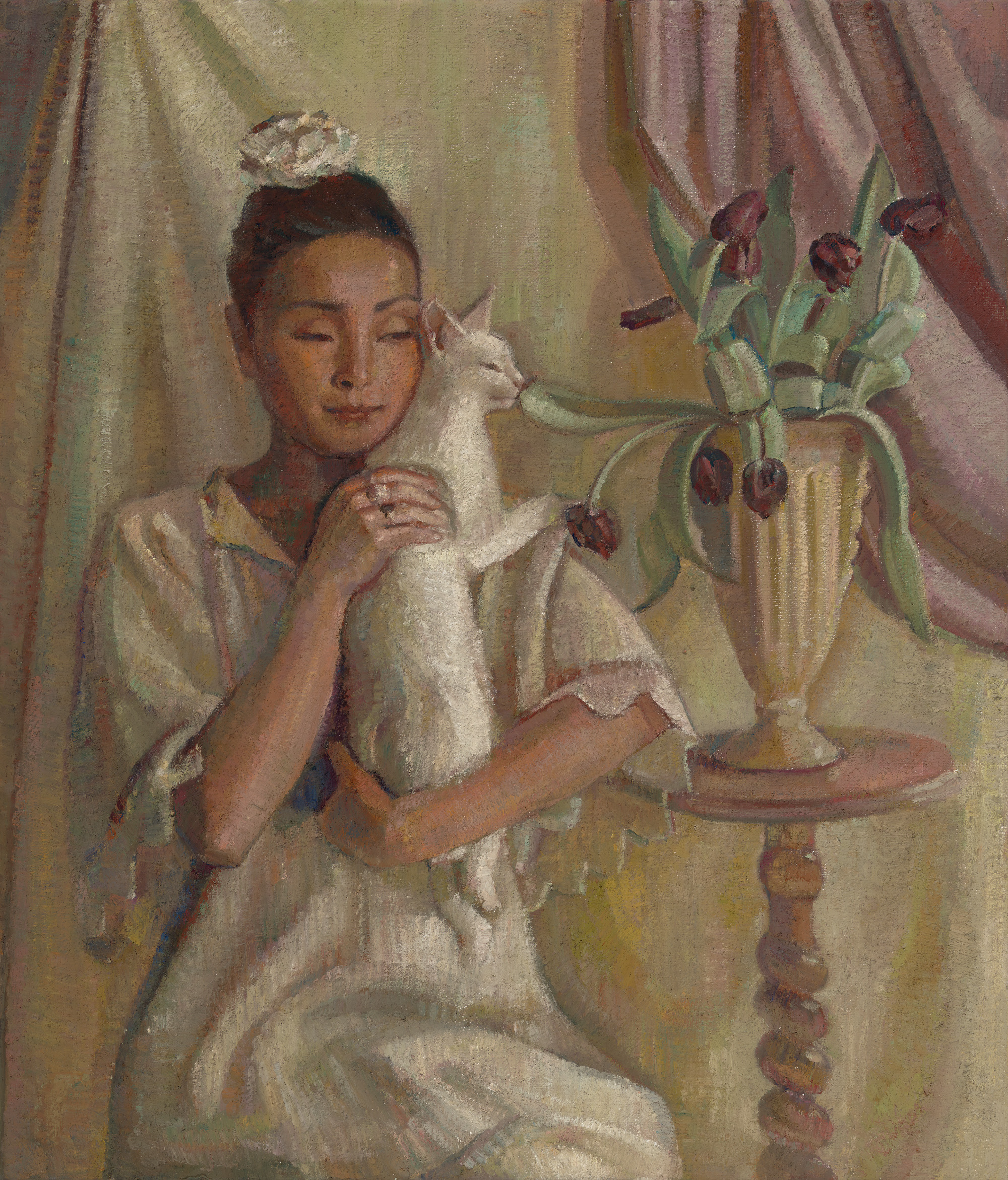 Yvette Coppersmith, Seated portrait with kitten and tulips 2024, Oil on jute. 101 x 85 cm Courtesy the artist and Sullivan+Strumpf, Melbourne and Sydney Photo: Matthew Stanton