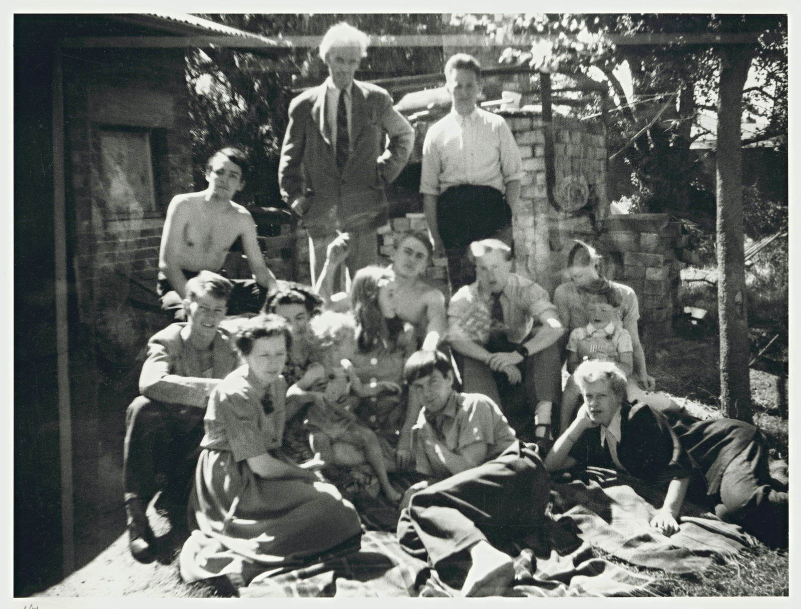 Albert Tucker (1914-1999), Untitled (Family group at Open Country) c.1951, (left to right, back) David Boyd, Merric Boyd, Hatton Beck Centre: Guy Boyd, Lucy Boyd (with child) Mary Boyd, John Perceval, unidentified, Yvonne and son Jamie Boyd, Front: Doris Boyd, Arthur Boyd, Joy Hester Gelatin silver photograph Source: State Library Victoria website